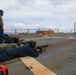 Sailors aboard the USS Howard conduct a small arms gunshoot in the South China Sea