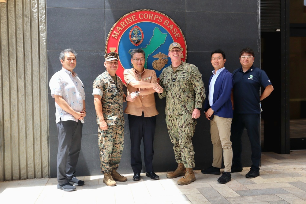 Military Leadership and Representatives of Japan Pose in Front of the Receently Completed Base Admin Building