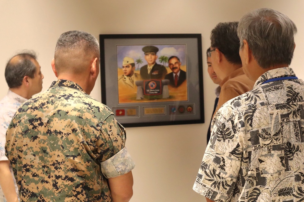 Touring Dignitaries Reflect on a Portrait of the Namesake of Marine Corps Base Camp Blaz