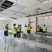 CAPT Blake Burket Leads a Tour of Communal Spaces Nearing Completion on Marine Corps Base Camp Blaz