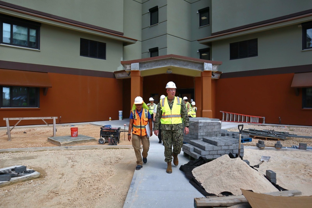 CAPT Blake Burket Leads a Site Tour of Bachelor Enlisted Quarter Under Construction