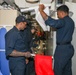 Sailors aboard the USS Howard conduct an integrated training team drill in the South China Sea