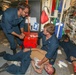 Sailors aboard the USS Howard conduct an integrated training team drill in the South China Sea