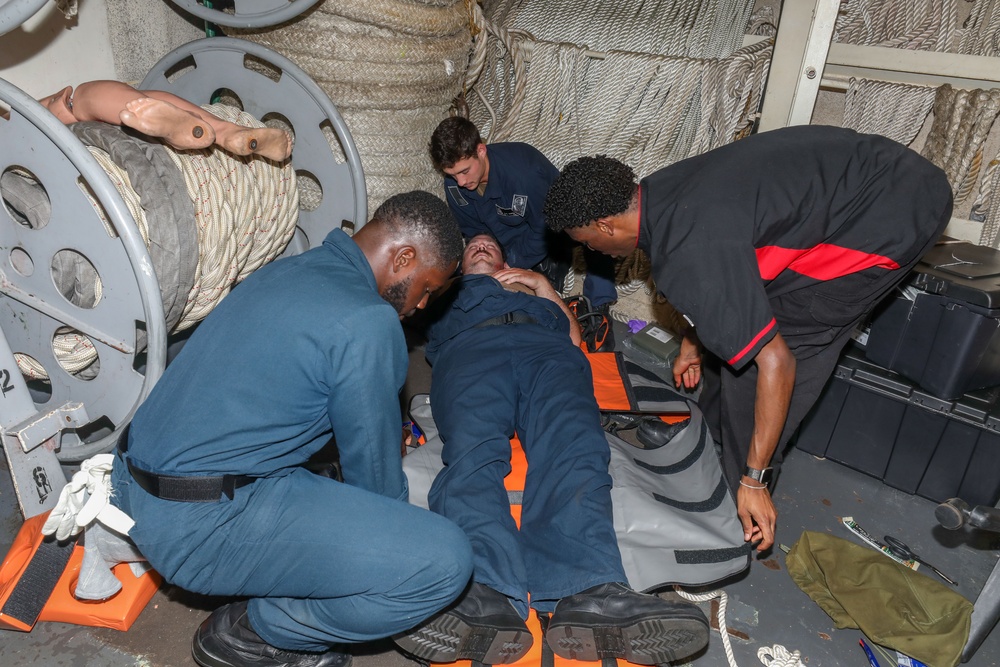 Sailors aboard the USS Howard conduct an integrated training team drill in the South China Sea