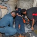 Sailors aboard the USS Howard conduct an integrated training team drill in the South China Sea