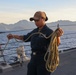 Sailors aboard the USS Howard conduct a sea and anchor detail in Subic, Philippines