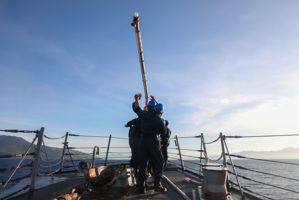 Sailors aboard the USS Howard conduct a sea and anchor detail in Subic, Philippines