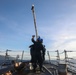 Sailors aboard the USS Howard conduct a sea and anchor detail in Subic, Philippines