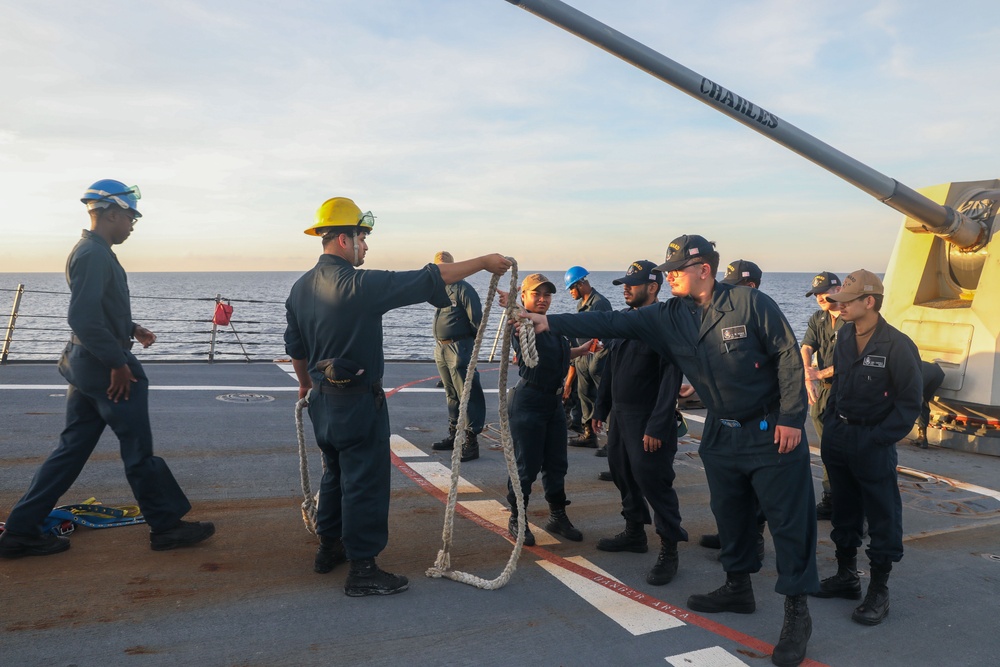 Sailors aboard the USS Howard conduct a sea and anchor detail in Subic, Philippines