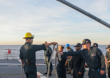 Sailors aboard the USS Howard conduct a sea and anchor detail in Subic, Philippines