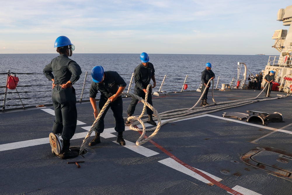 Sailors aboard the USS Howard conduct a sea and anchor detail in Subic, Philippines