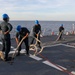 Sailors aboard the USS Howard conduct a sea and anchor detail in Subic, Philippines