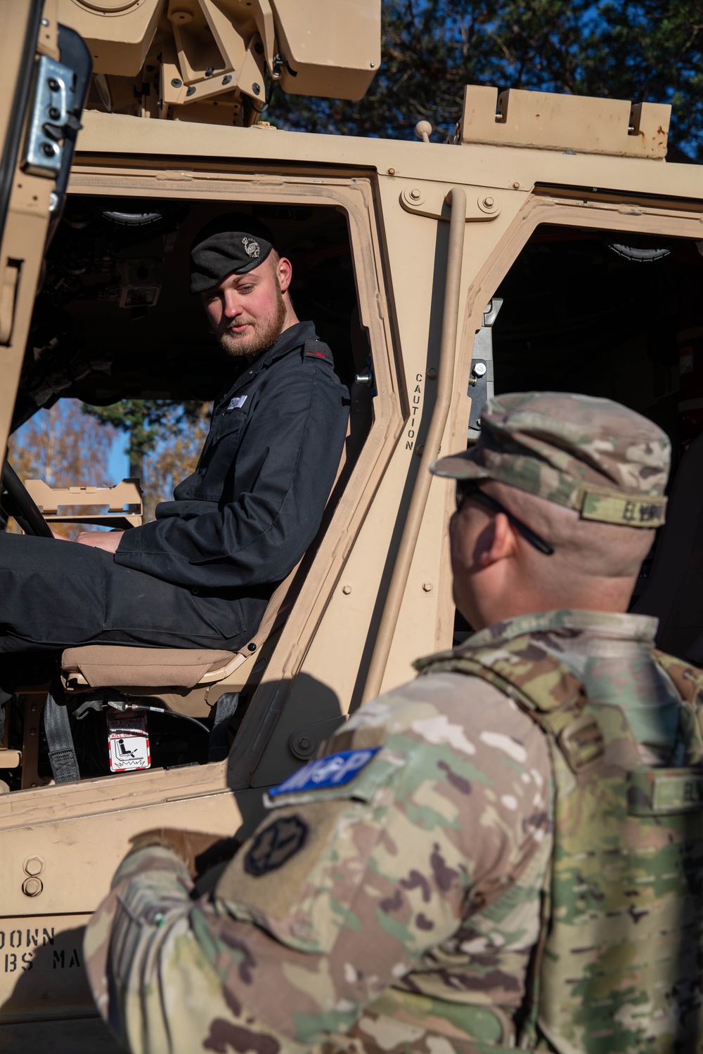 U.S. Army soldiers display combat vehicles in Johvi, Estonia