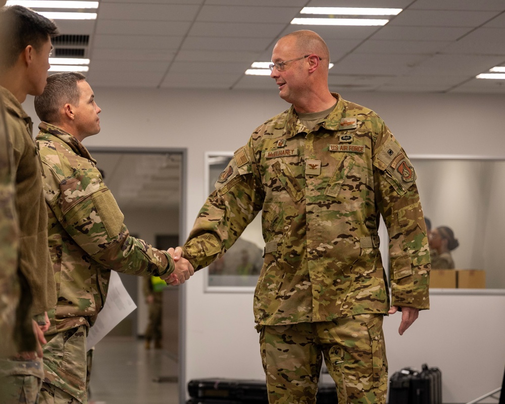 374 AW command team visit Airmen during BM 25-1