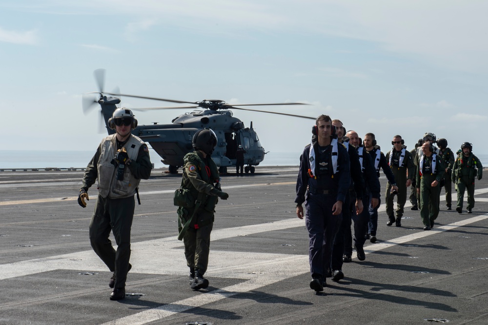 Service members from the Italian military visit USS Abraham Lincoln