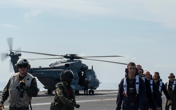 Service members from the Italian military visit USS Abraham Lincoln