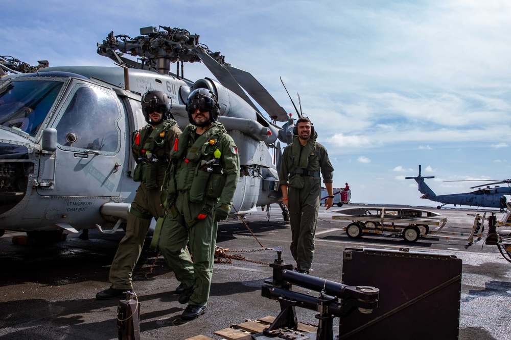 Service members from the Italian military visit USS Abraham Lincoln