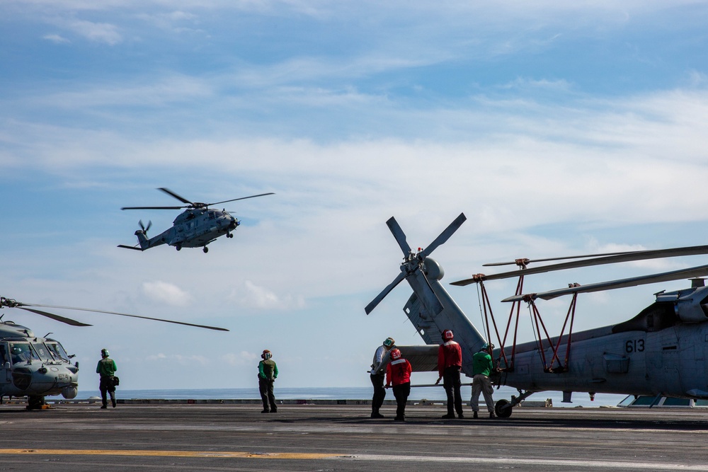 Service members from the Italian military visit USS Abraham Lincoln