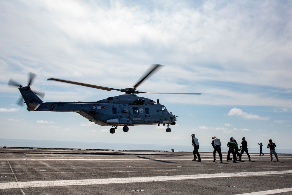 Service members from the Italian military visit USS Abraham Lincoln