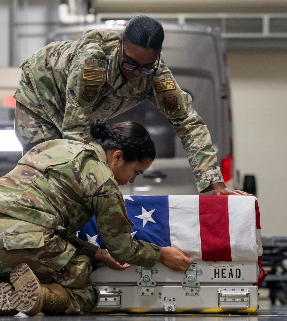 AFMAO Airman practice flag draping