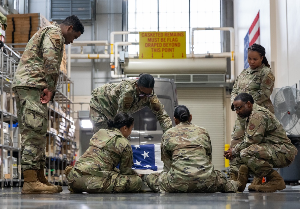 AFMAO Airman practice flag draping