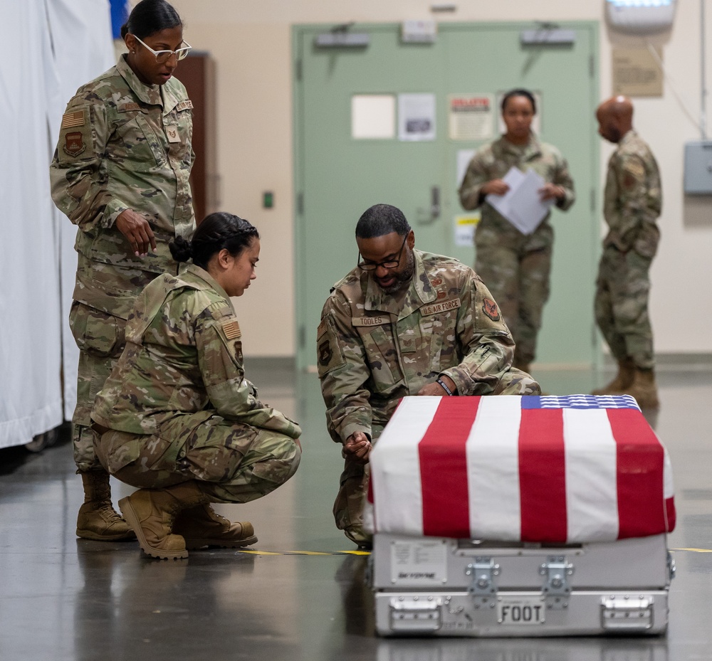 AFMAO Airman practice flag draping