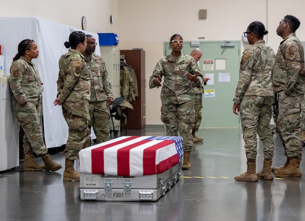 AFMAO Airman practice flag draping