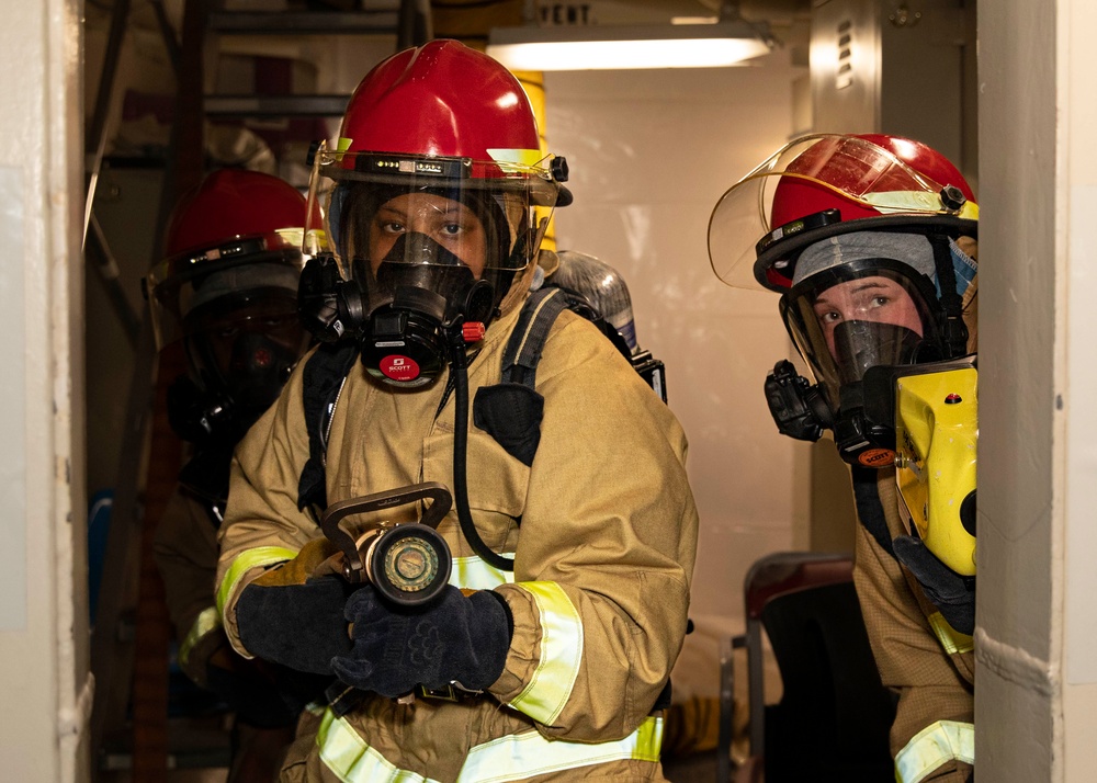 USS George H.W. Bush Sailors participate in a firefighting drill.