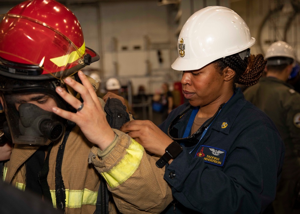 USS George H.W. Bush Sailors participate in a firefighting drill.