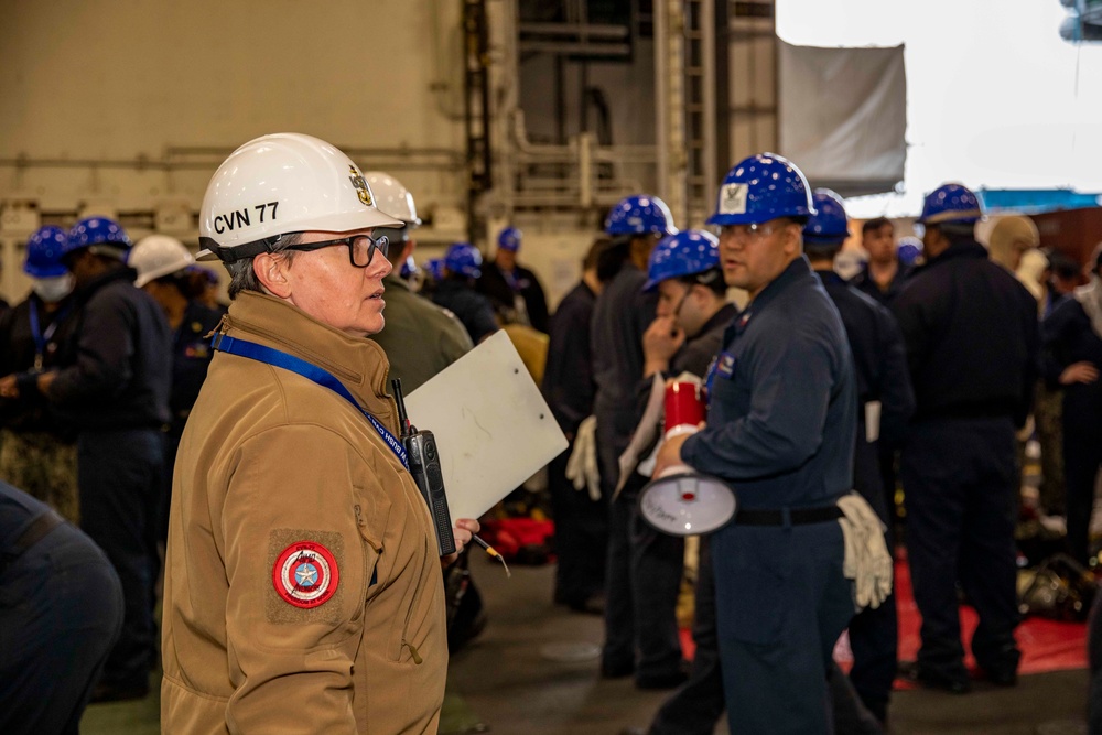 USS George H.W. Bush Sailors participate in a firefighting drill.