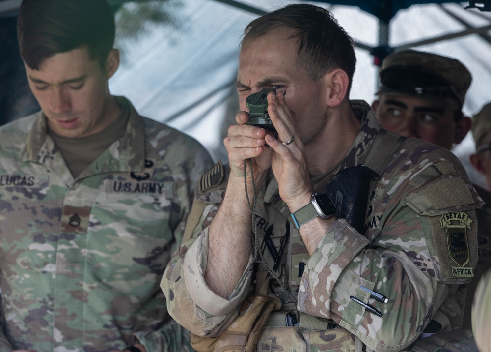 Soldiers practice resection and navigation techniques during E3B