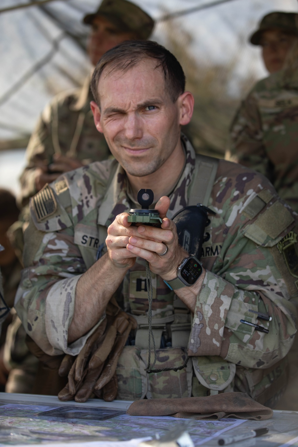 Soldiers practice resection and navigation techniques during E3B