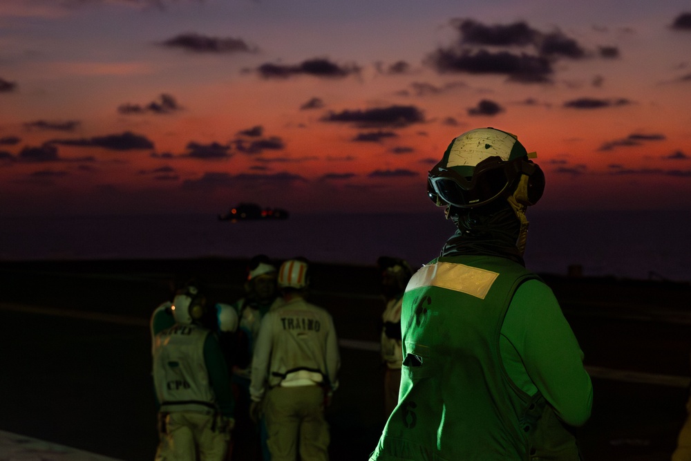 Abraham Lincoln conducts a replenishment-at-sea with Amelia Earhart