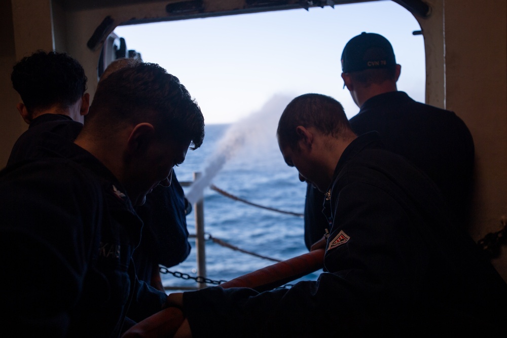 USS Ronald Reagan (CVN 76) conducts counter measure wash down