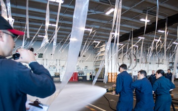 USS Ronald Reagan (CVN 76) conducts counter measure wash down