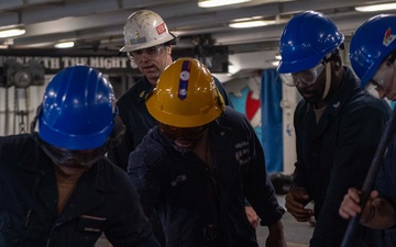 USS Ronald Reagan (CVN 76) Sailors perform an anchor drop test