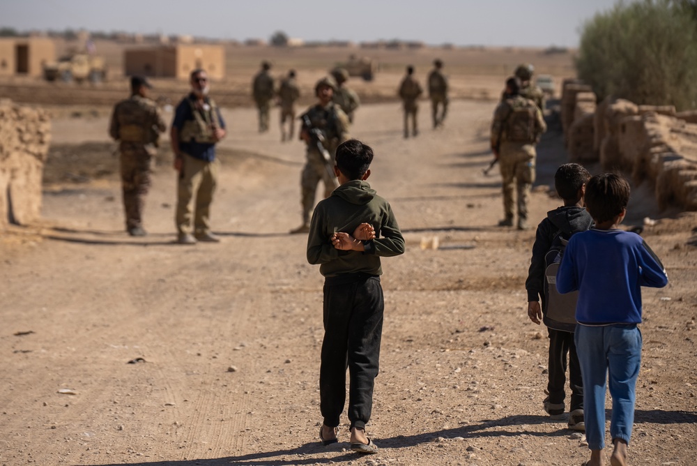 U.S. Soldiers and Syrian Democratic Forces conduct joint patrol