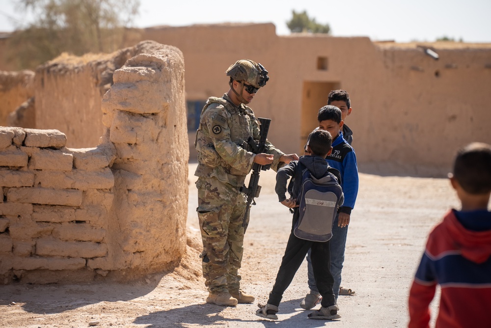 U.S. Soldiers and Syrian Democratic Forces conduct joint patrol