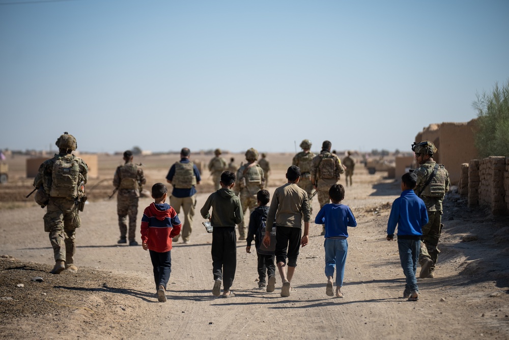 U.S. Soldiers and Syrian Democratic Forces conduct joint patrol