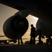 Golden light, ready flight: Airmen prep a KC-135 for takeoff at sunset