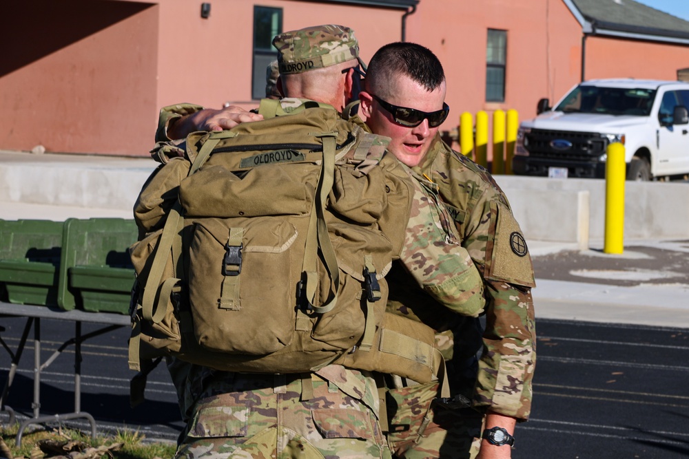 Best Warrior competitors complete a 10-mile ruck march