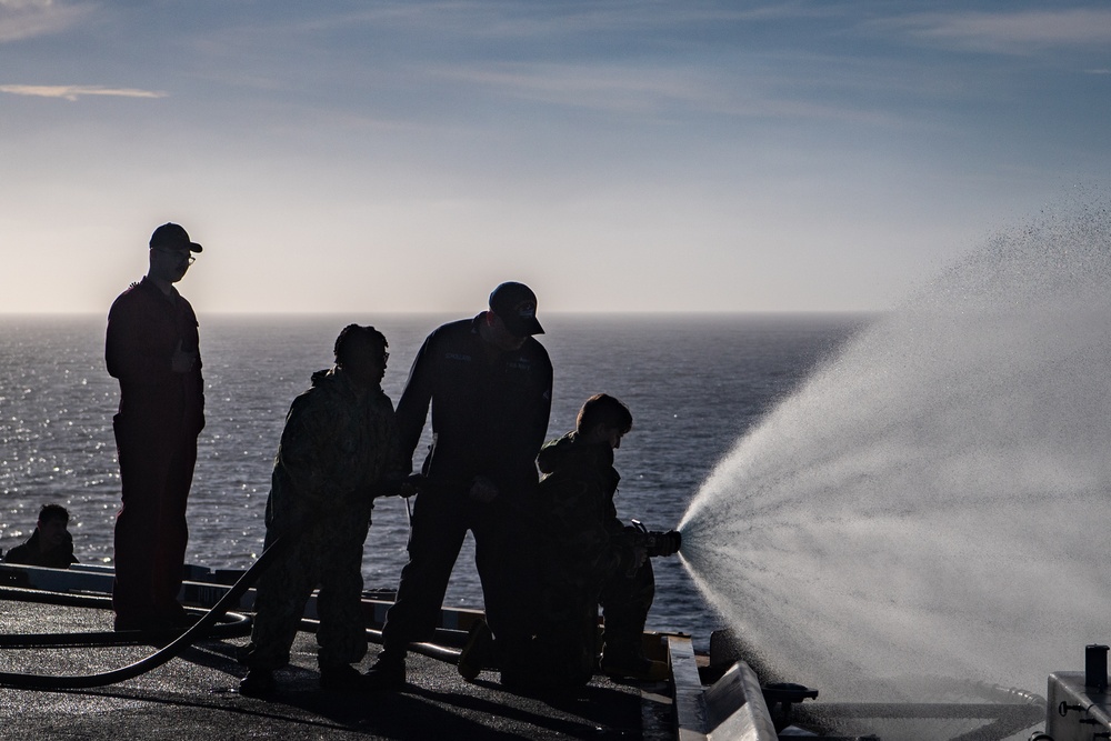 USS Ronald Reagan (CVN 76) conducts a counter-measure washdown