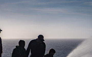 USS Ronald Reagan (CVN 76) conducts a counter-measure washdown