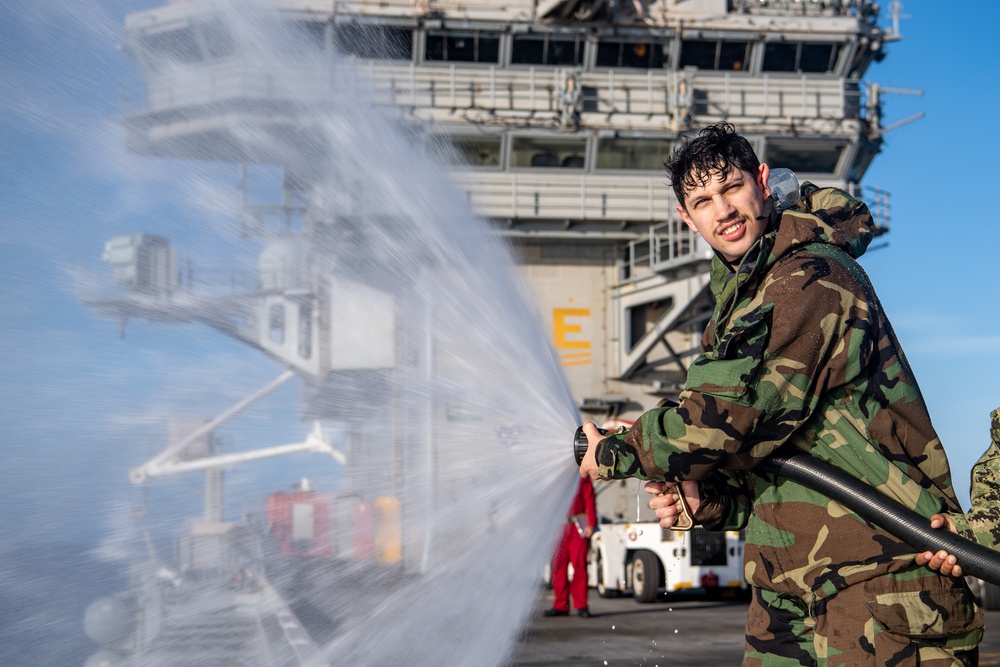 USS Ronald Reagan (CVN 76) conducts a counter-measure washdown