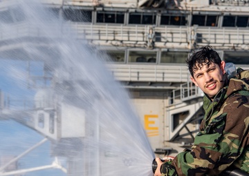 USS Ronald Reagan (CVN 76) conducts a counter-measure washdown