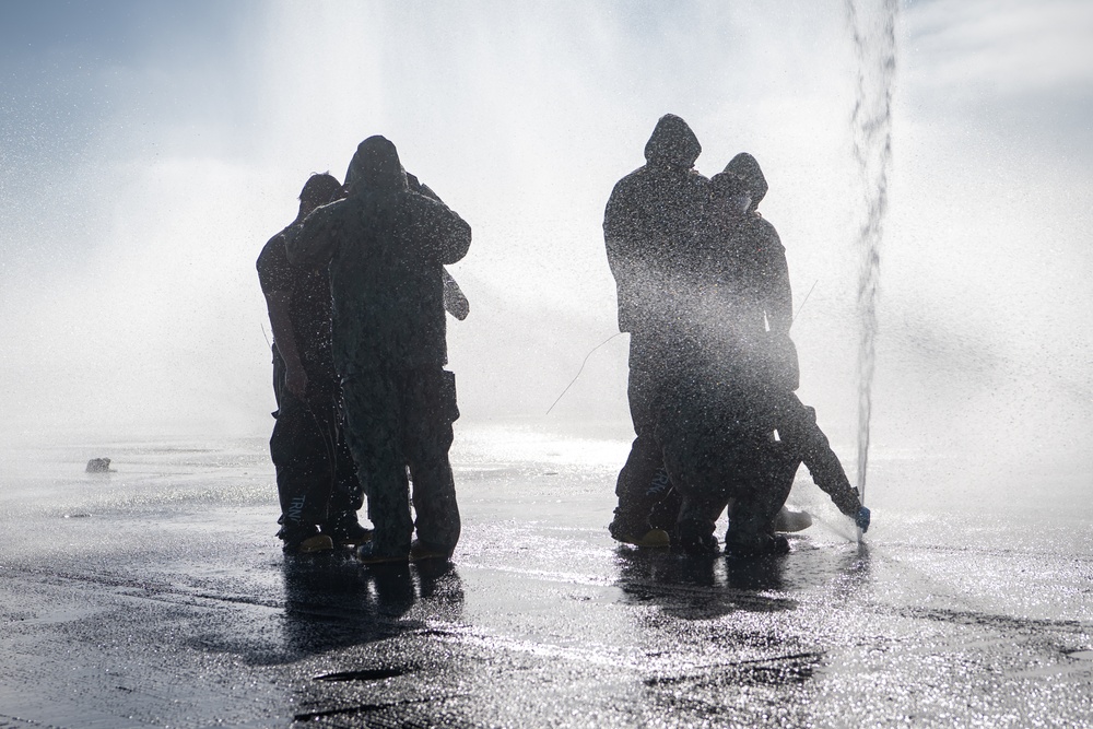 USS Ronald Reagan (CVN 76) conducts a counter-measure washdown