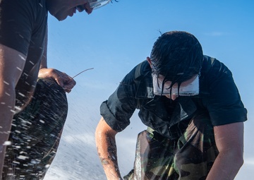 USS Ronald Reagan (CVN 76) conducts a counter-measure washdown