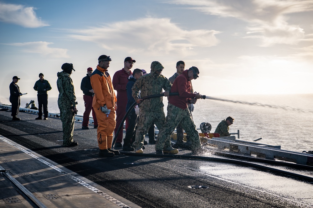 USS Ronald Reagan (CVN 76) conducts a counter-measure washdown