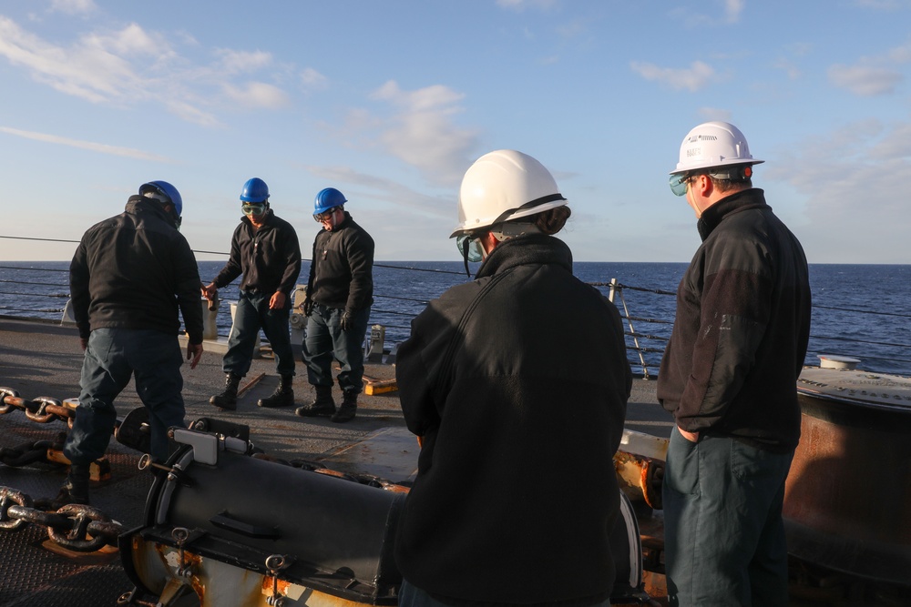 Sailors aboard the USS Howard conduct a sea and anchor detail in Yokosuka, Japan