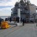 Sailors aboard the USS Howard conduct an ammo offload in Yokosuka, Japan